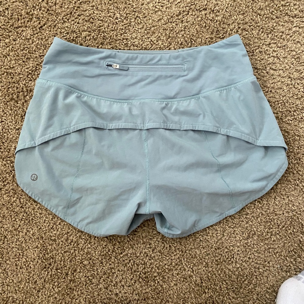 Lululemon Blue Swiftly Tech 4” inseam shorts